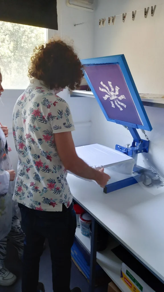 Students screen printing at Marbella Design Academy